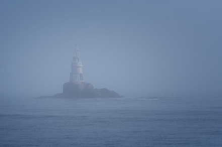 Lighthouse Along Rocky Coastline