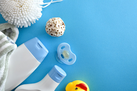 Bath products on blue table for baby diagonal composition, a Health & Medical Photo by Davizro's Market