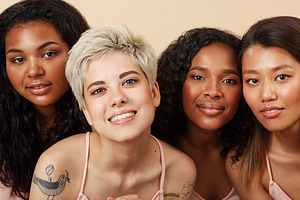Group portrait of four diverse women, a Person Photo by Artem Varnitsin