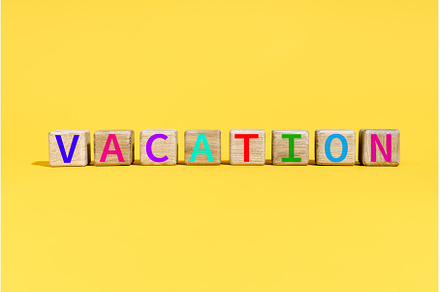 The word VACATION on wooden blocks