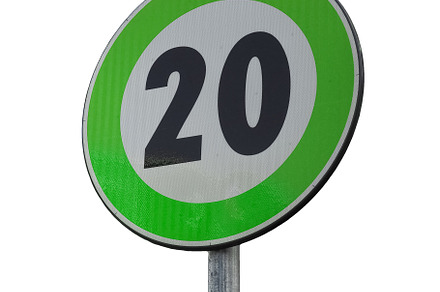 Green advisory speed limit sign
