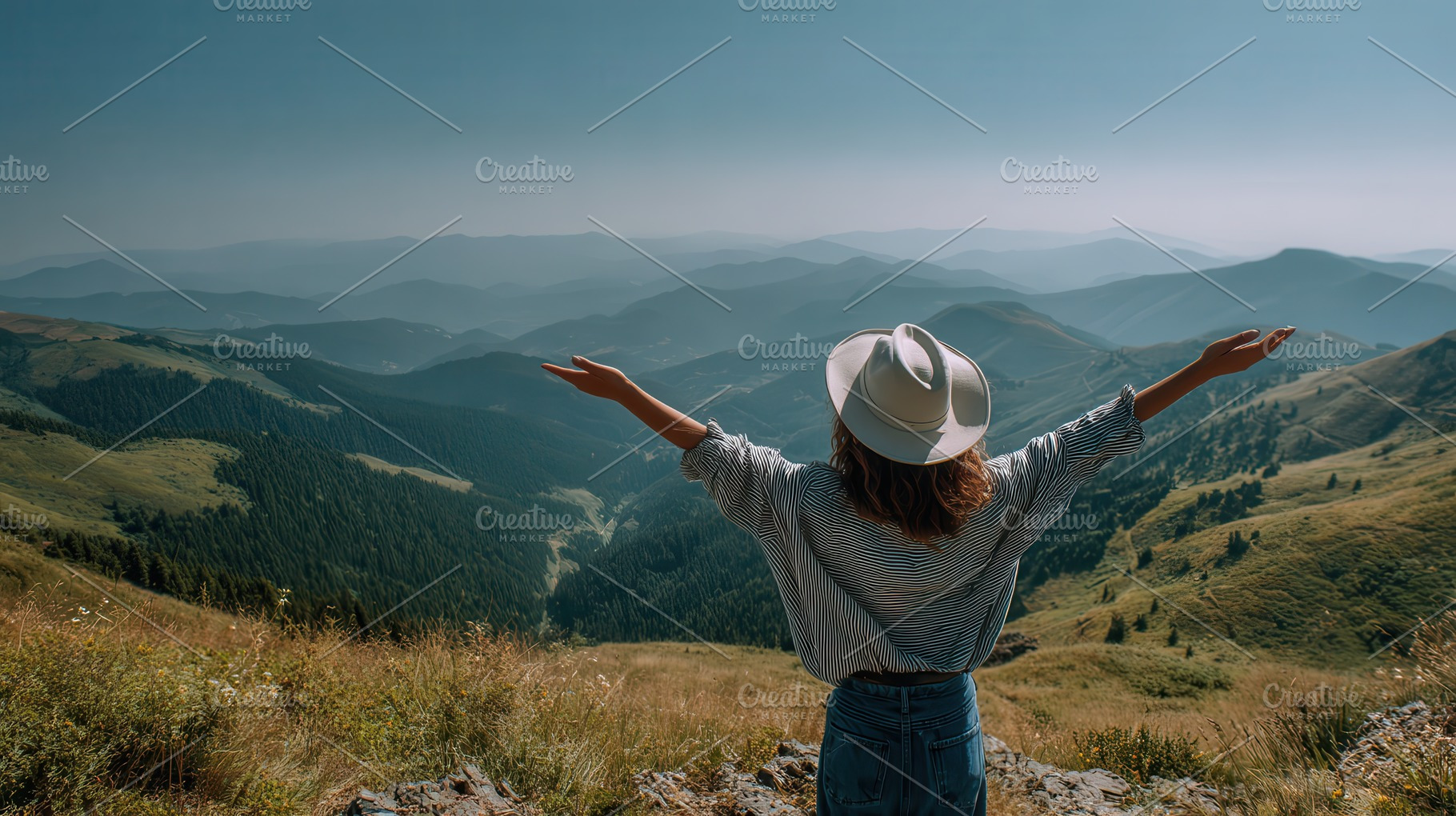 Woman in hat enjoying mountain view, a Photo by Pixeness Studio
