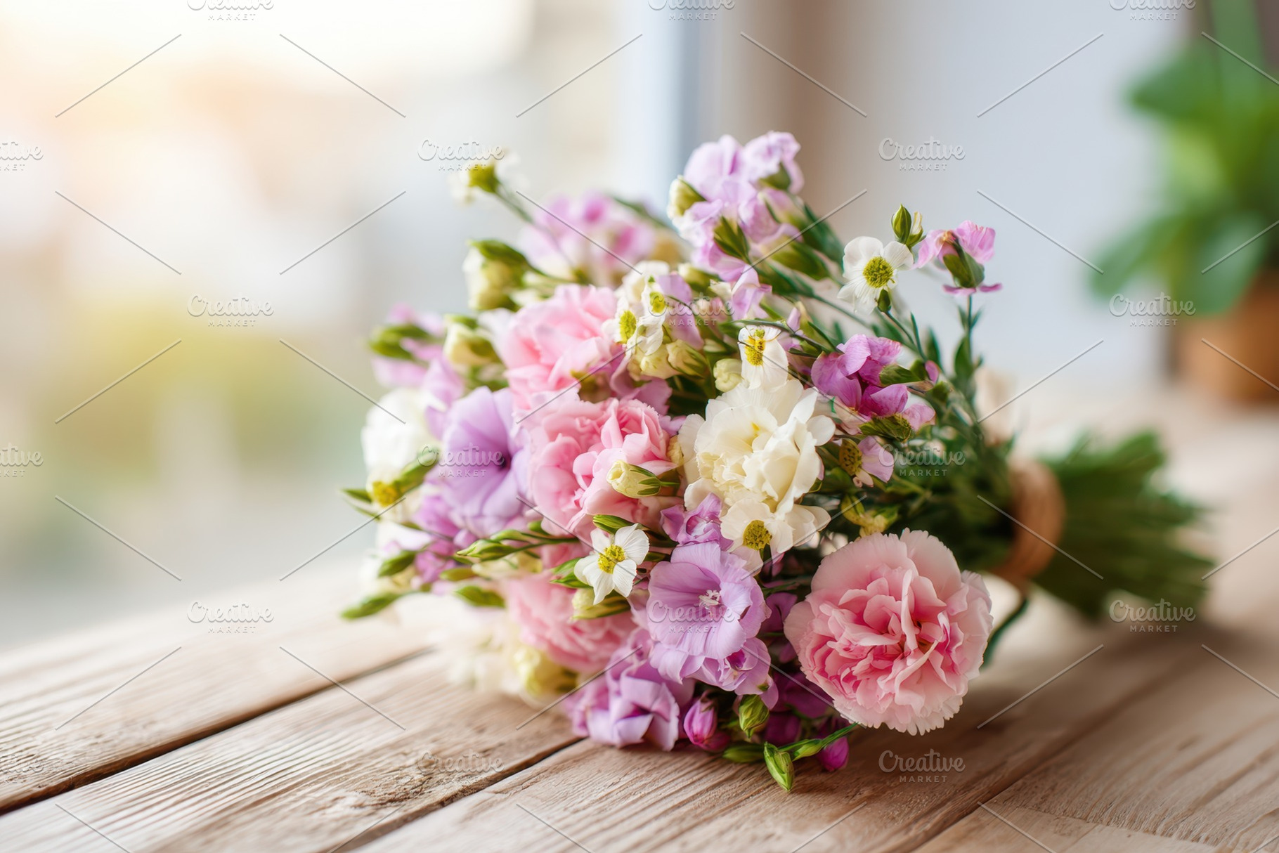 Pastel bouquet on wooden table, a Nature Photo by AlyaAnd