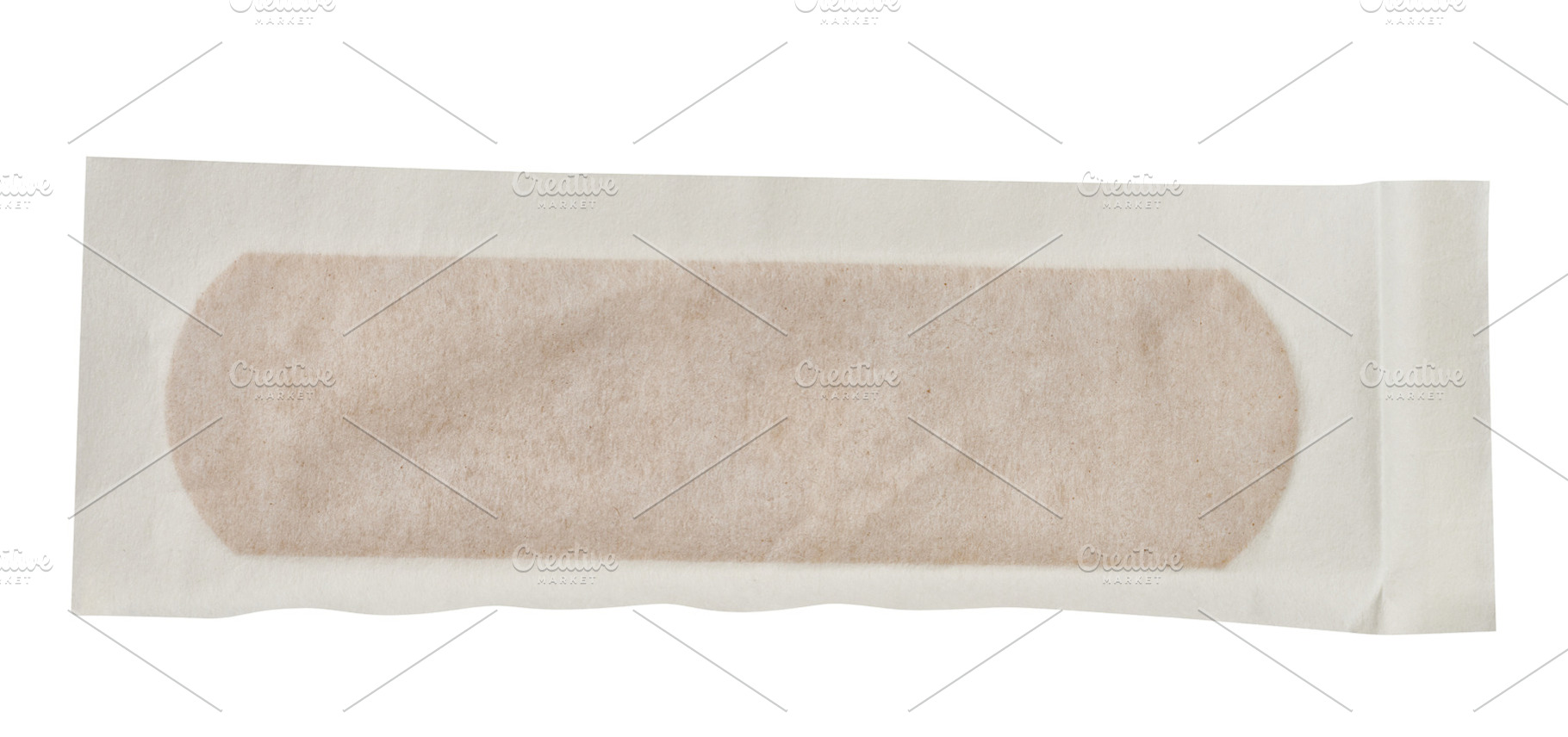 Brown medical plaster in a sealed paper protective package on an, a Health & Medical Photo by ndanko