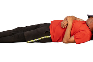 Isolated image of man sleeping with head on backpack, a Person Photo by DanFLCreativo