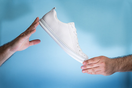 Stylish white Sneakers, a Photo by wr7 Media