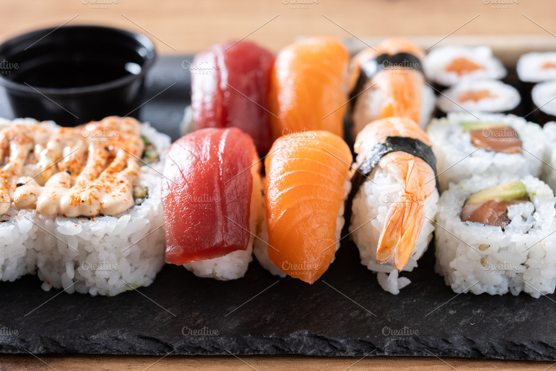 Assorted sushi platter with nigiri and rolls, a Food & Drink Photo by etorres69