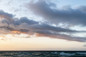 Sunset over a calm Florida Pensacola beach with gentle waves, soft clouds, and, a Nature Photo by AS photostudio