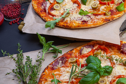 Delicious fresh pizza on dark