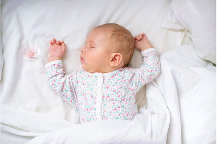 Newborn baby sleeps on a white bed, a Person Photo by yanadjana