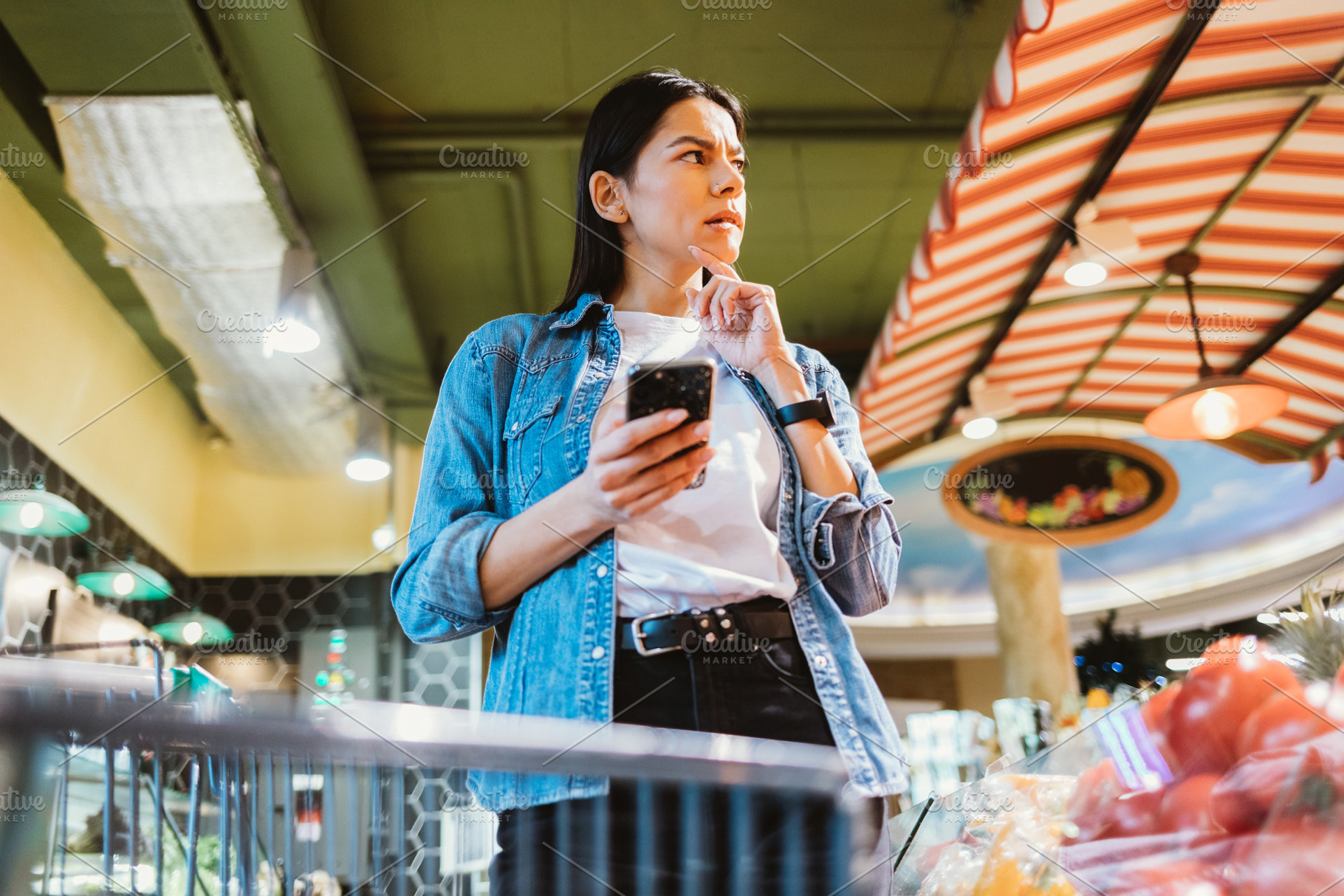 Brunette woman with mobile phone, a Person Photo by progressman