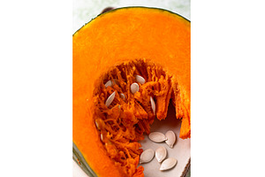 Raw sliced pumpkin with seed, a Food & Drink Photo by Yulia Furman