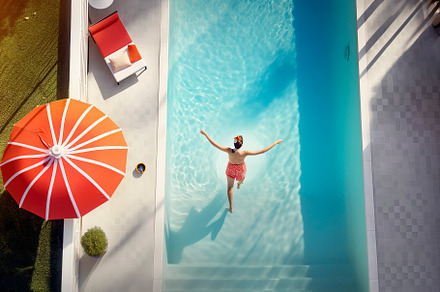 Girl in the pool from above, a Person Photo by huertas19