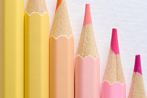 Close-up of six sharp-tipped colored pencils arranged horizontal, a School & Education Photo by ndanko
