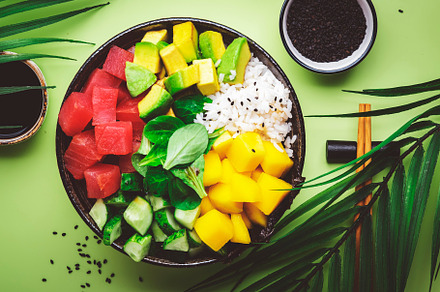 Hawaiian poke bowl with tuna, avocado, mango, cucumber, lamb let, a Food & Drink Photo by 5PH