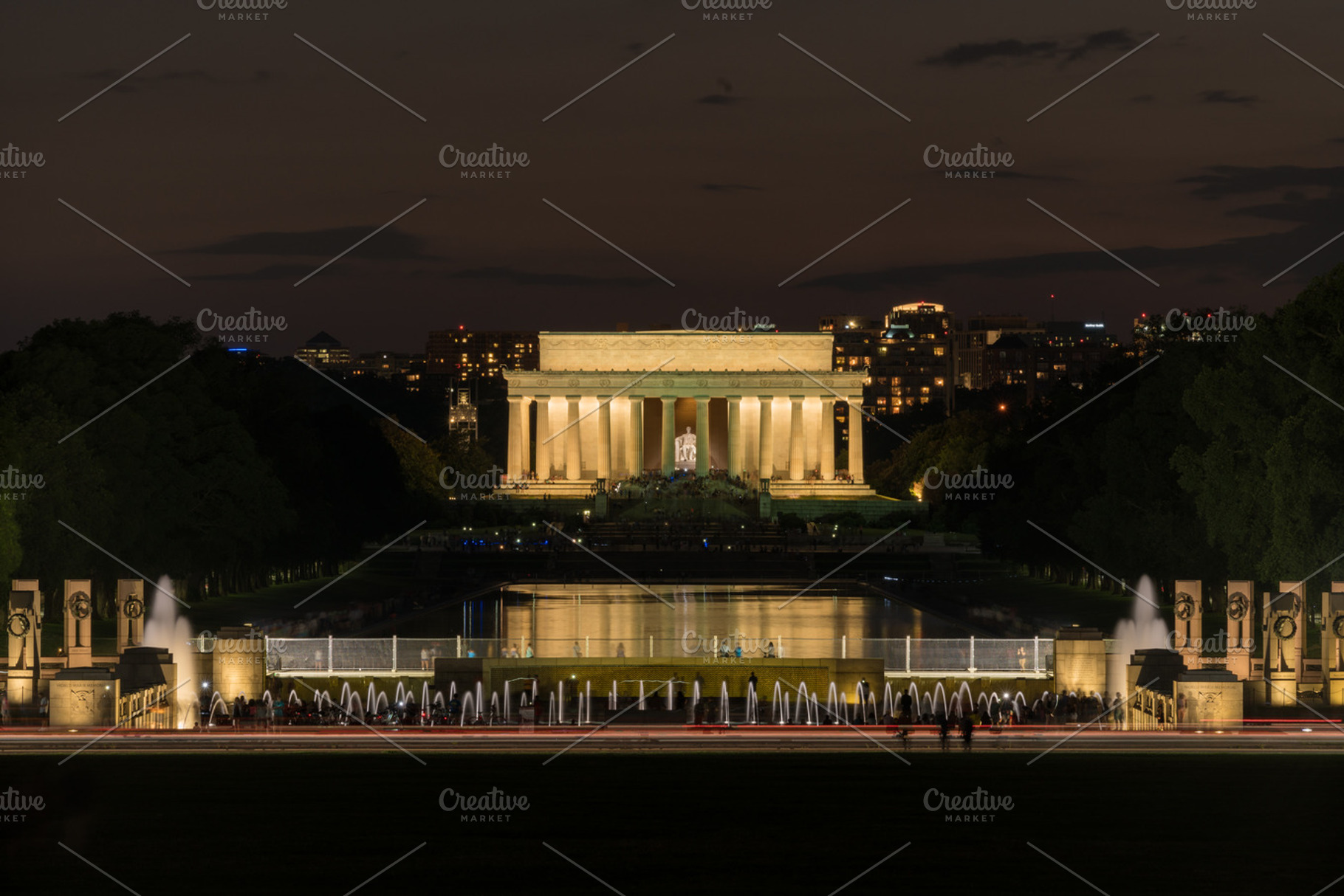 Lincoln Memorial at night over World War Two memorial, an Architecture Photo by Backyard Stock