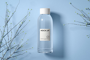 Glass Water Bottle Mockup, a Packaging Mockup by Designer Dude