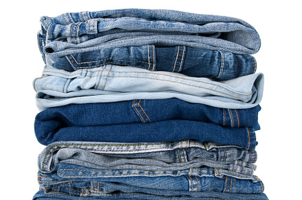 Stack of blue denim clothes, a Beauty & Fashion Photo by Studio Light & Shade