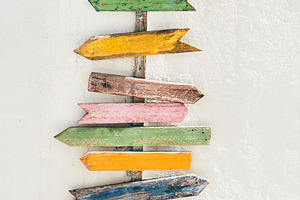 Colorful arrow sign mock-up wall, a Photo by SkyNext