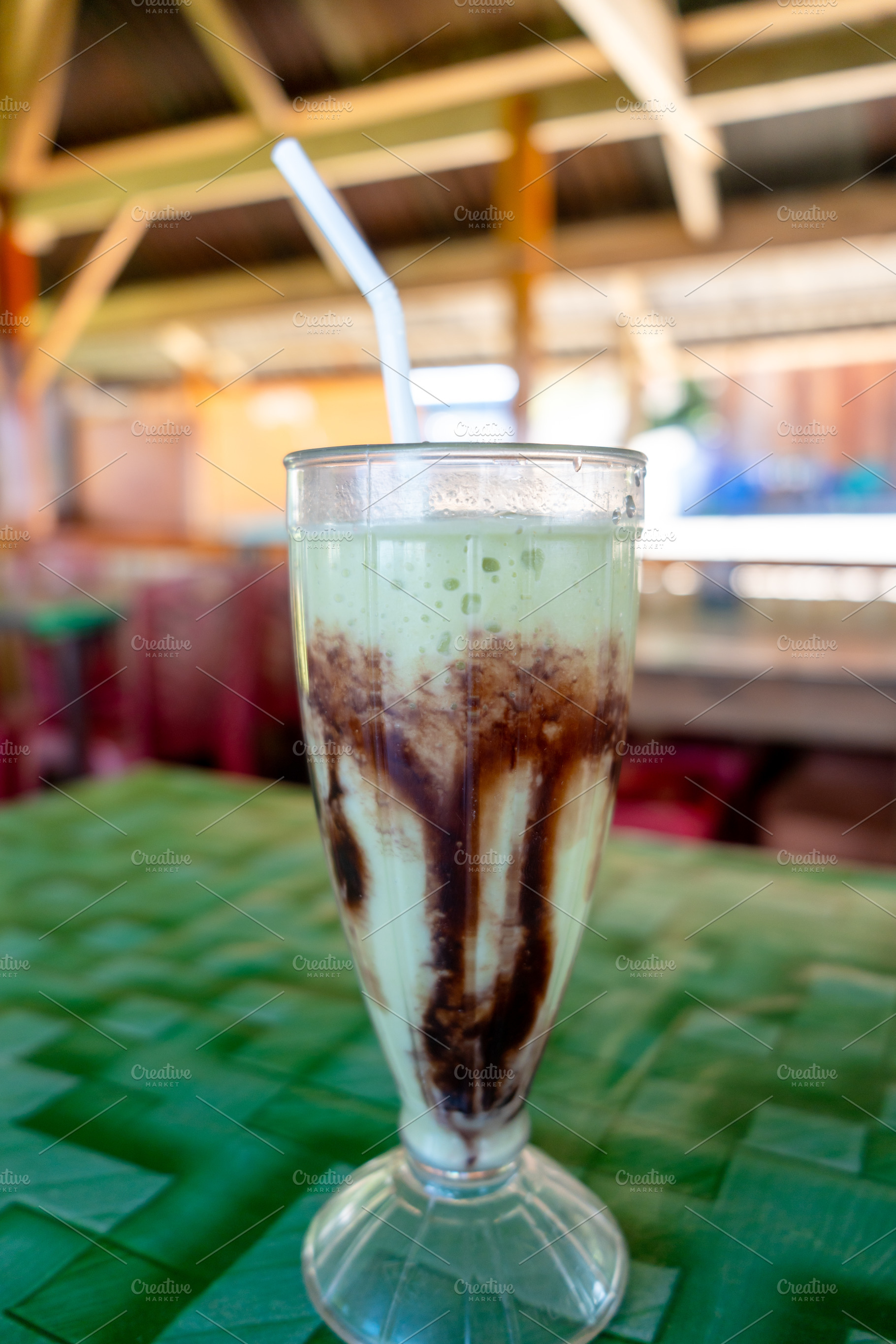 Avocado cocoa milkshake in Toraja land, Sulawesi, Indonesia, a Nature Photo by GoodGoods