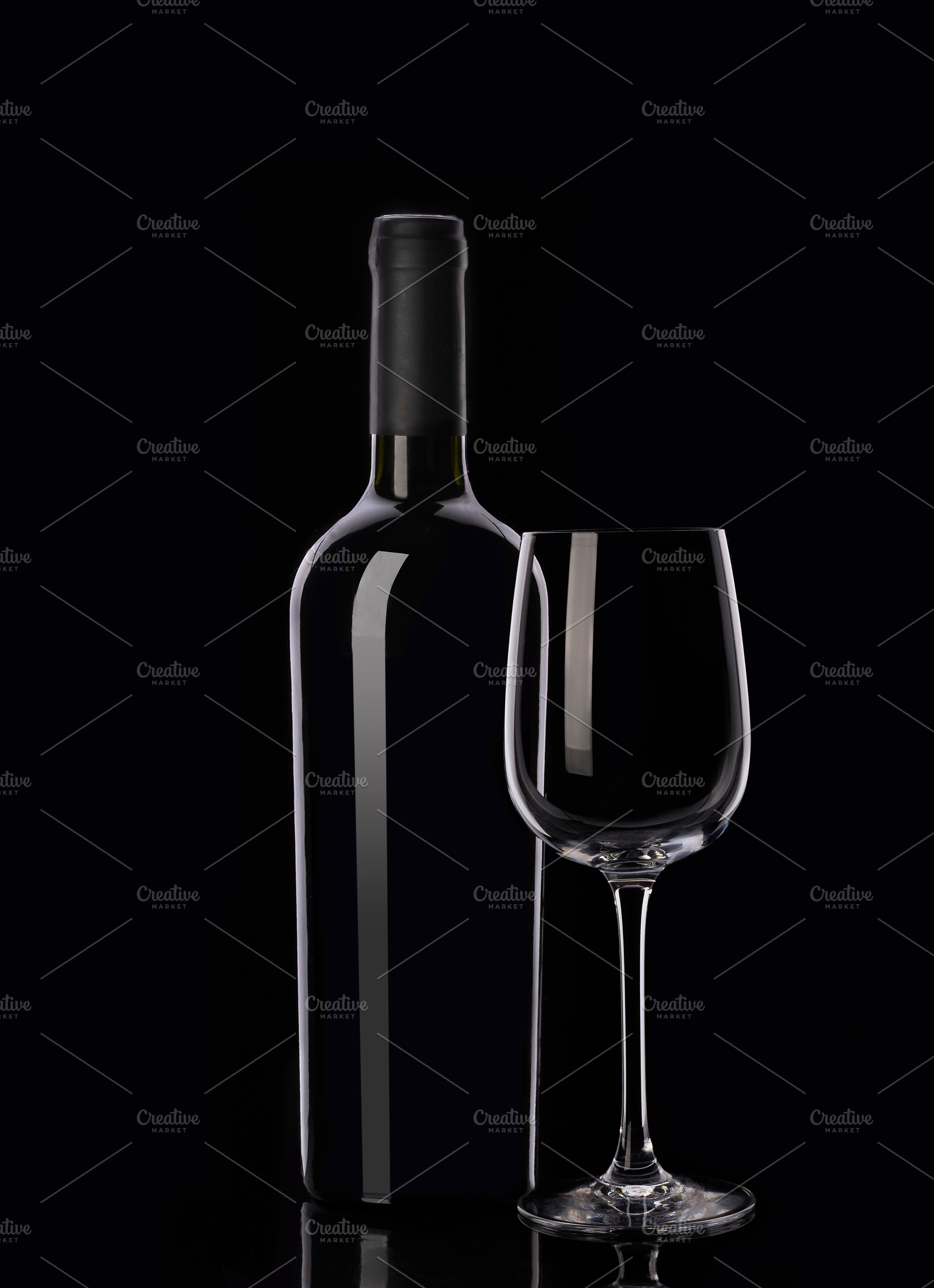 Red wine bottle and glass containing bottle, glass, and red, a Food & Drink Photo by Alexander Novikov