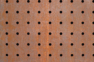 brown rusted holed steel metal texture background, a Photo by WorldOfPhotos