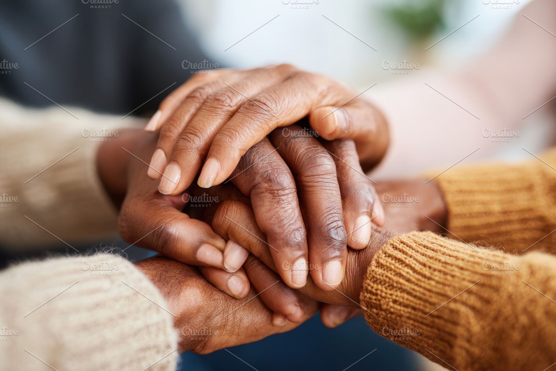 Unity and support through diverse hands, a Person Photo by AlyaAnd