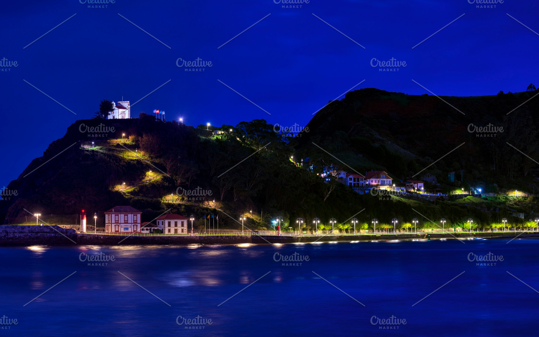Ribadesella with Hermitage of Guia on a blue hour., a Nature Photo by CreativePhotoSpain