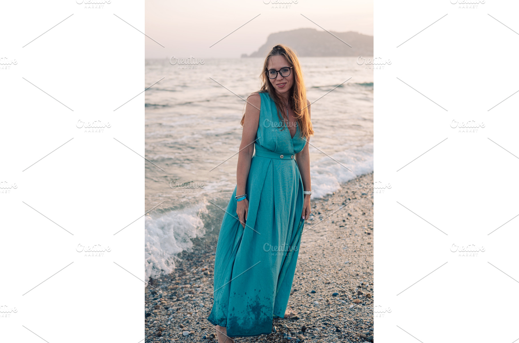 Woman in Flowing Dress on Seaside, a Person Photo by Jan Jack Russo Media
