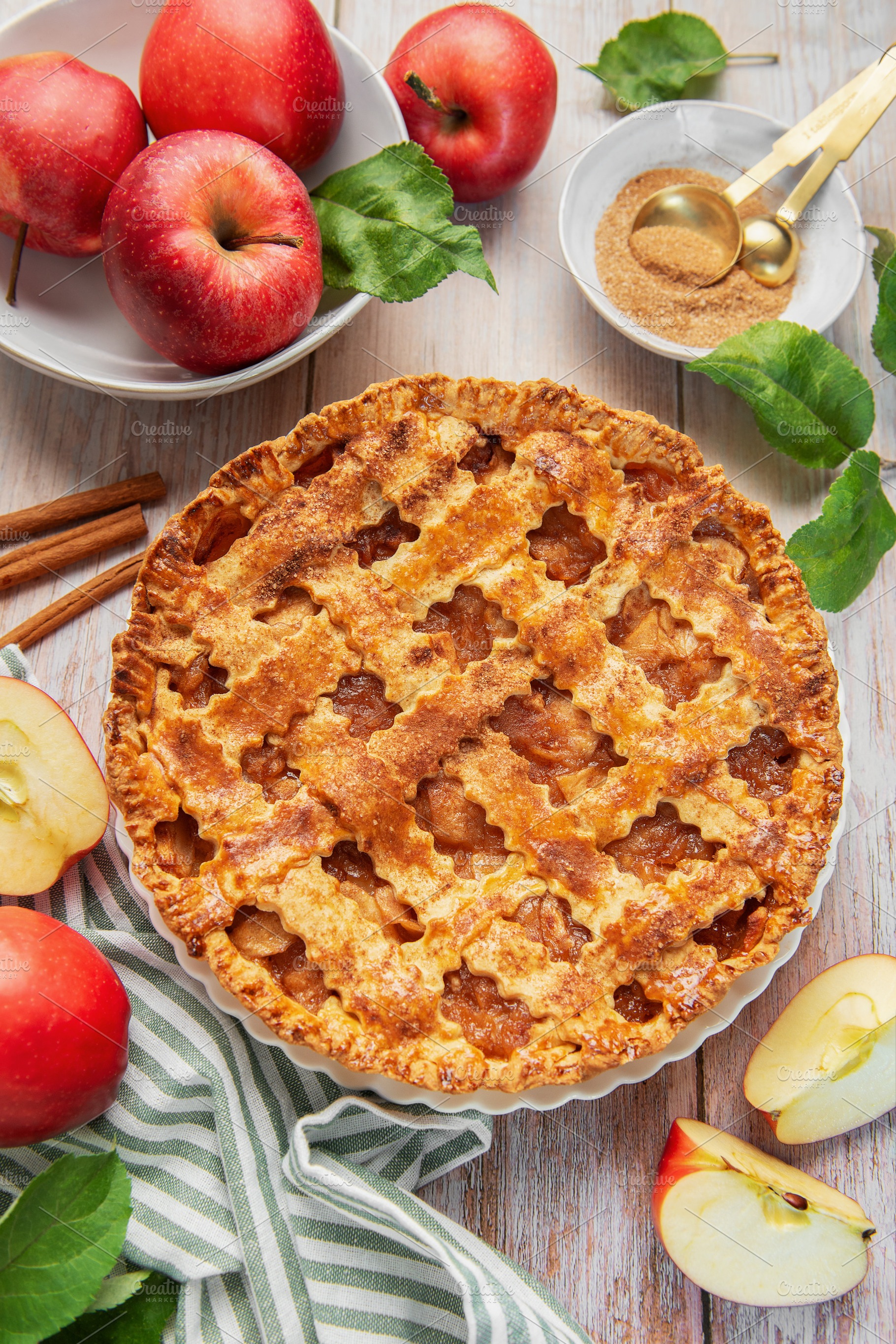 Delicious homemade apple pie showing baking ingredients on rusti, a Food & Drink Photo by Olena Rudo