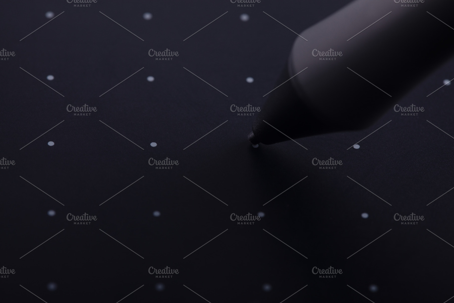 Close-up of a stylus pen tip hovering over a dotted black graphi, a School & Education Photo by Ales Munt