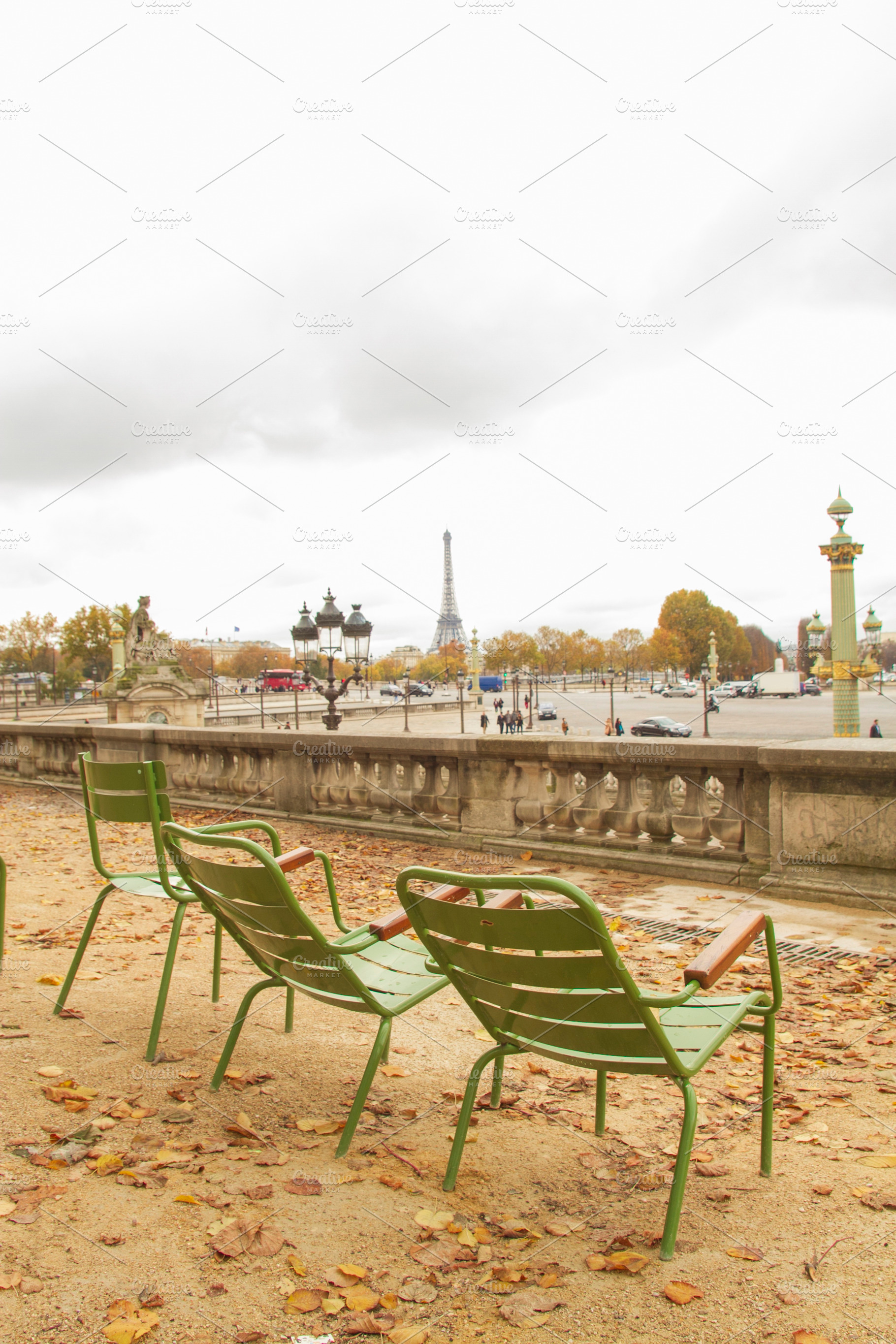 Green park chairs in Tuileries Garden with Eiffel Tower view, au, a Photo by Pictures for you!!!!!!!!!