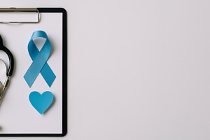 Men health awareness concept with stethoscope and blue ribbon on, a Photo by Dvoevnore photos