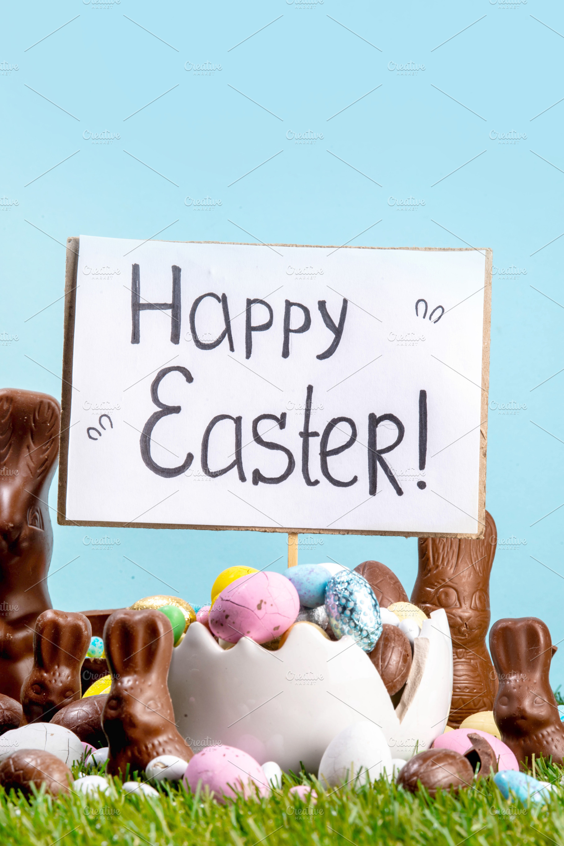 Easter egg hunting background with chocolate eggs, Easter basket, a Holiday Photo by Rimma