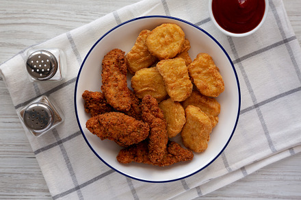 Homemade Chicken Strips and Nuggets, a Food & Drink Photo by LiudmylaChuhunova