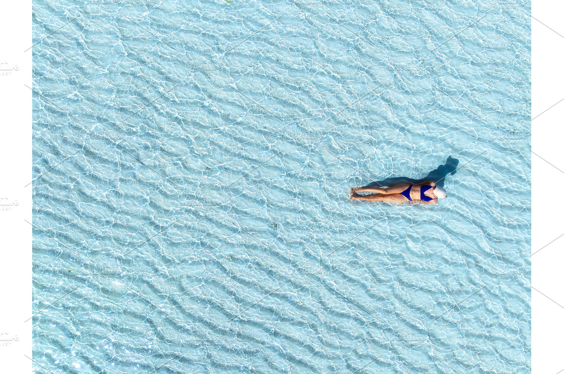 Aerial view of woman in bikini and, a Person Photo by den-belitsky