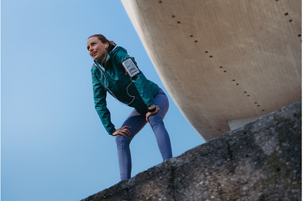 Tired female runner taking a rest, a Sports & Recreation Photo by HalfPoint