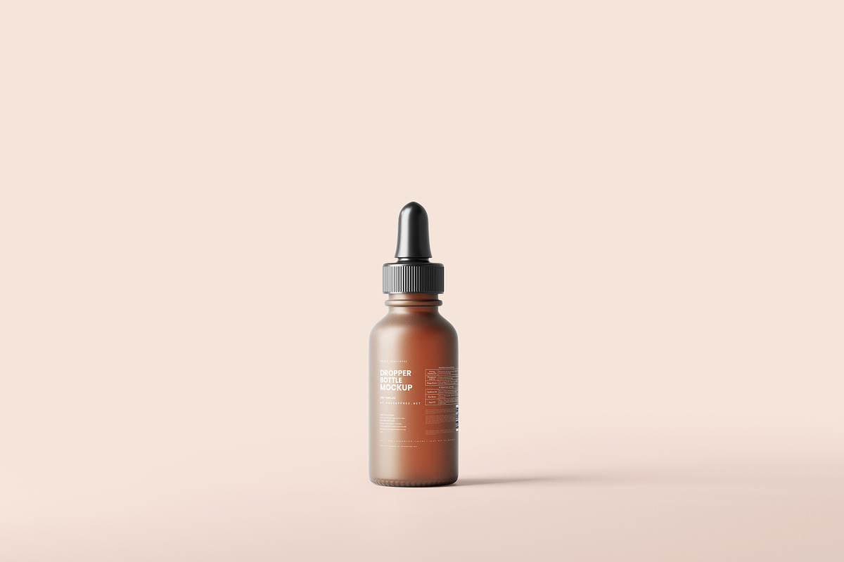 Frosted Glass Dropper Bottle Mockups, a Packaging Mockup by MockupFree.Net (Photo 1 of 6)