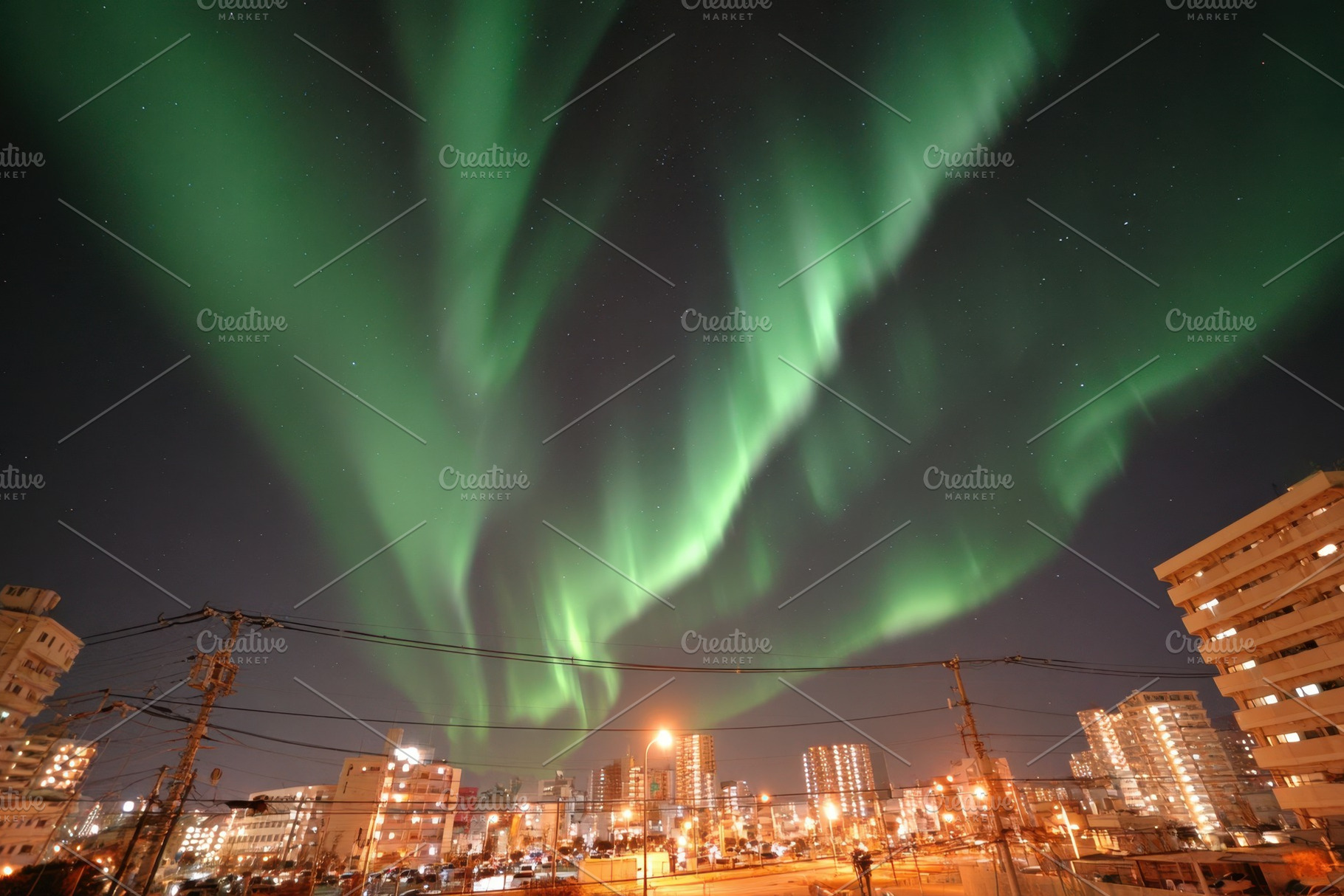 Vibrant northern lights over suburban landscape, a Wallpaper Photo by AlyaAnd