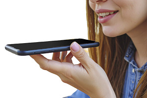 Person engages with an AI assistant on their smartphone at coffe, a Technology Photo by DanFLCreativo