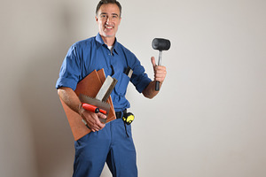 Tiler with ok gesture holding tools with isolated background, a Person Photo by Davizro's Market