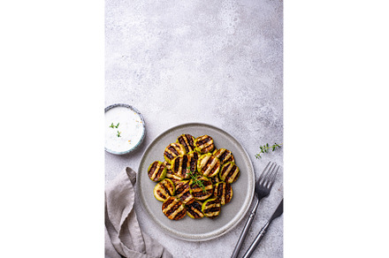 Grilled zucchini with garlic sauce