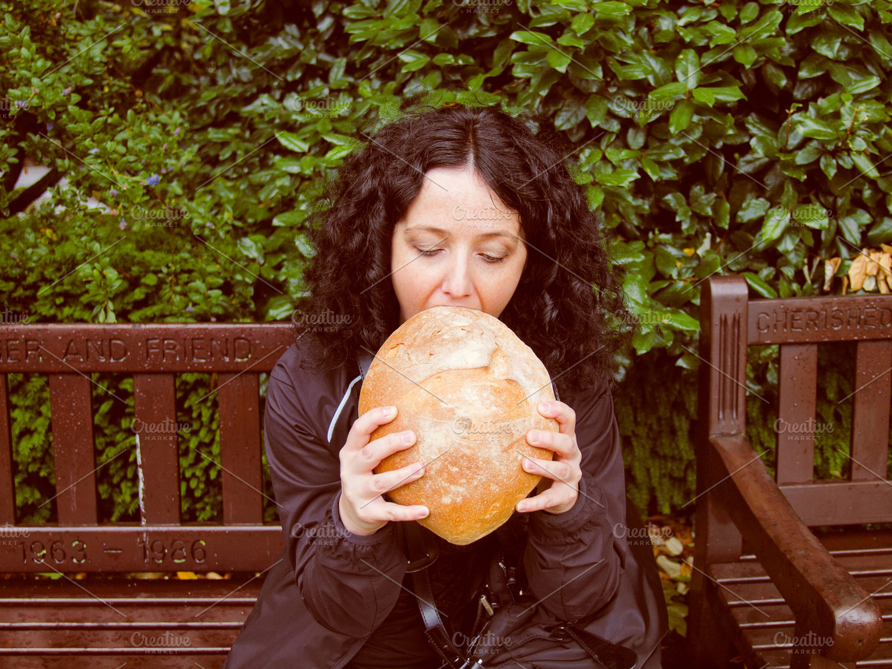 Girl eating bread containing model, girl, and woman, a Person Photo by WorldOfPhotos