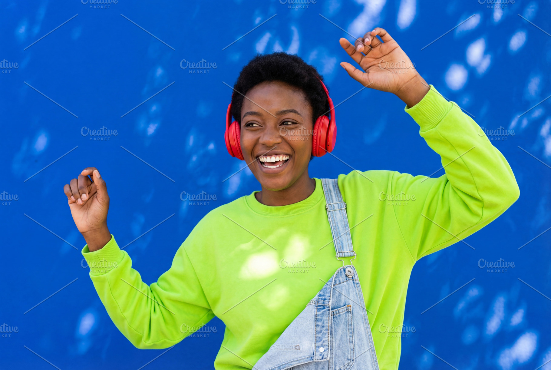Joyful Young Black Woman Dancing, a Person Photo by Virgo Studio