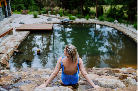 Rear view of young woman in swimsuit, a Nature Photo by HalfPoint