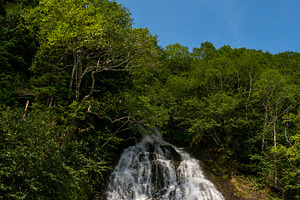 Waterfall streaming down rocky slope
