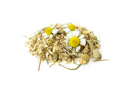 Pile of dried chamomile isolated on white background, a Food & Drink Photo by AtlasStudio
