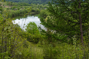 Spring picturesque river band view. Mountains scenery view behin