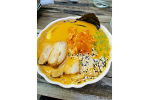 Kimchi ramen in white bowl on wooden, a Food & Drink Photo by sceptical cactus