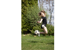 Girls playing with a soccer ball, a Sports & Recreation Photo by Nenahliadava Design